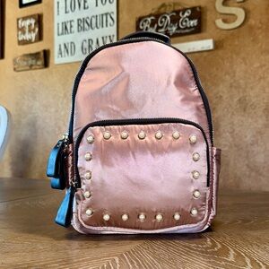 Kiss Me Couture satin pink, faux pearl studded backpack